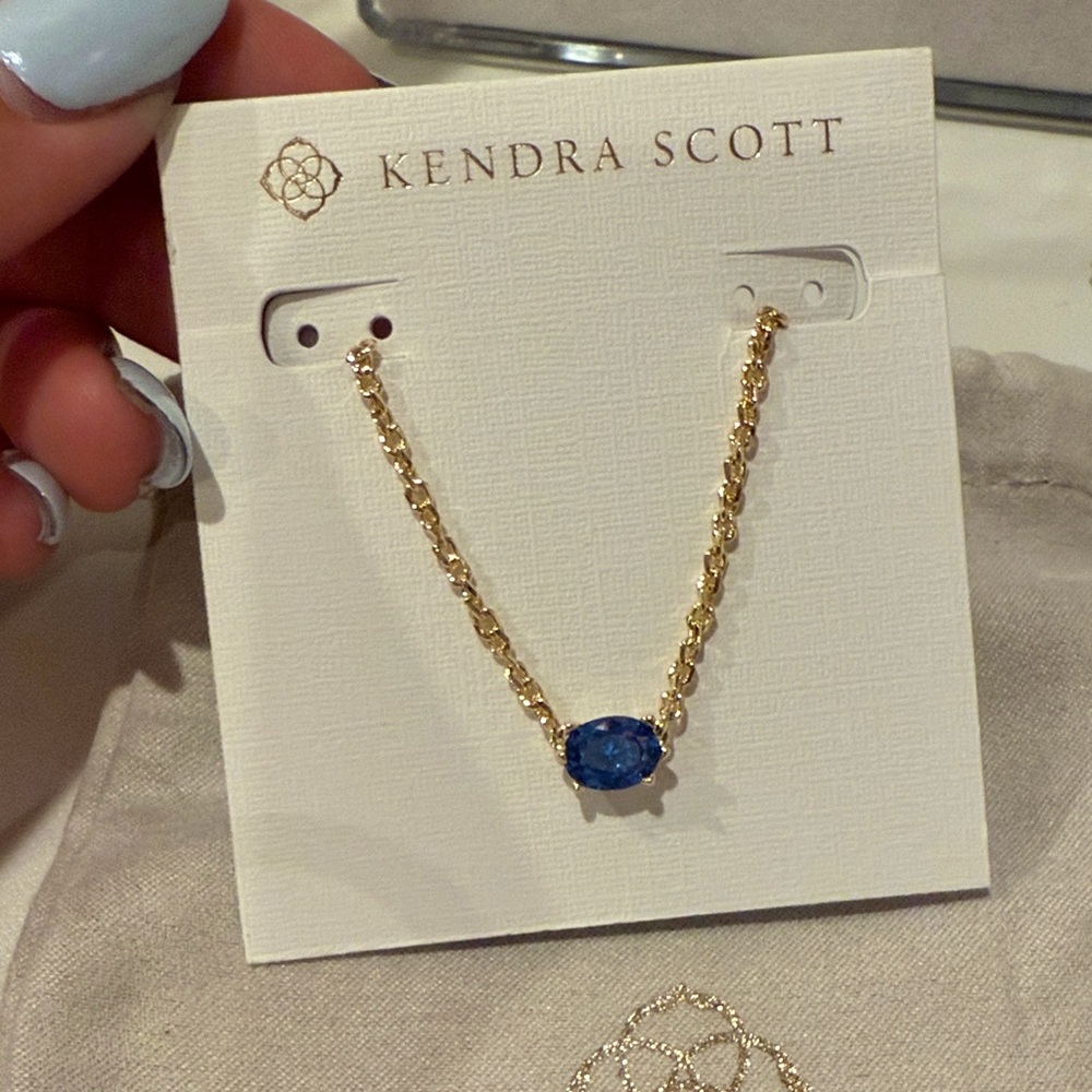 NWT Kendra Scott Gold Necklace with Blue Stone